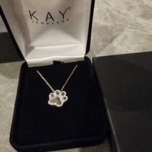 Sterling silver paw print necklace from Kay Jewelers never worn